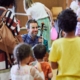 Musician talking with a group of children