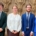Four young singers, wearing smart clothing, stood together for a photo in Southwell Minster.
